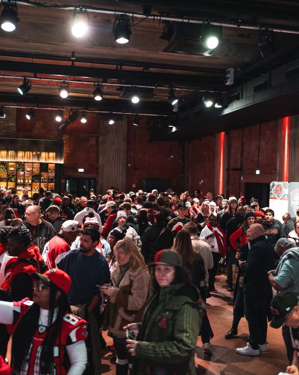 Crowd of fans inside the Falcons Haus venue