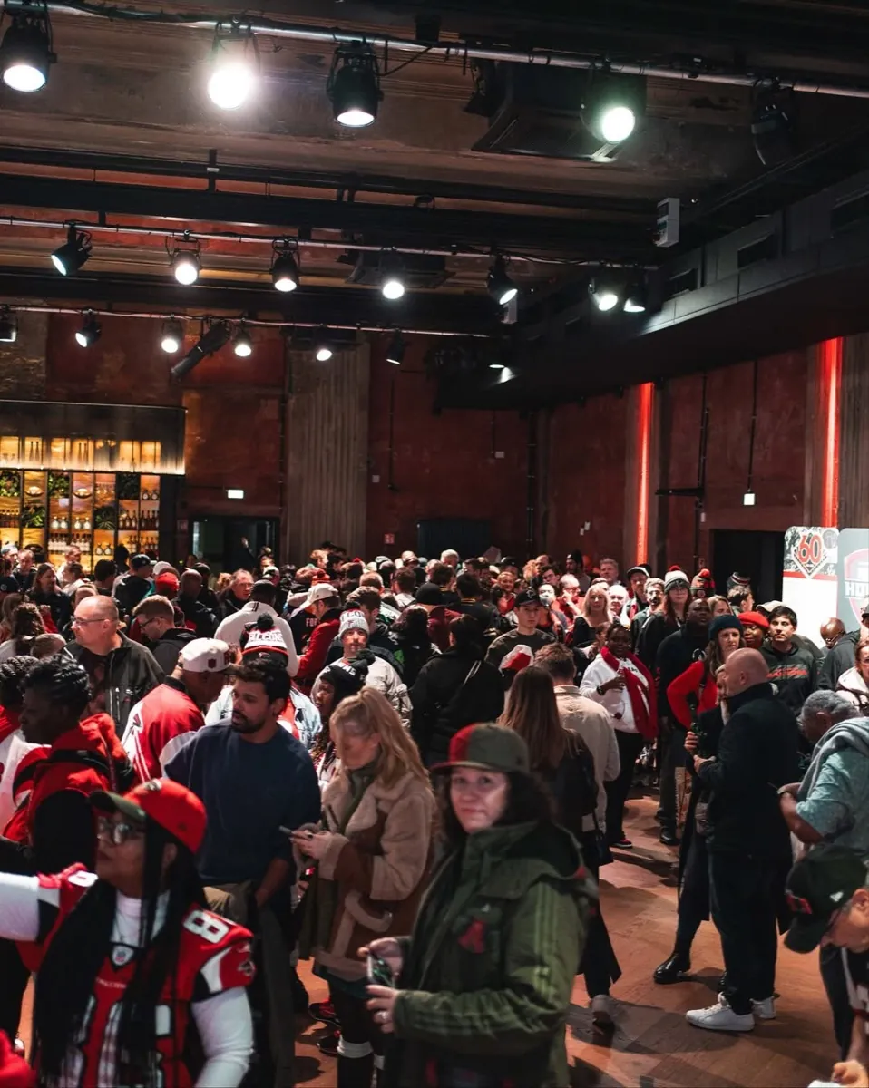 Crowd of fans inside the Falcons Haus venue