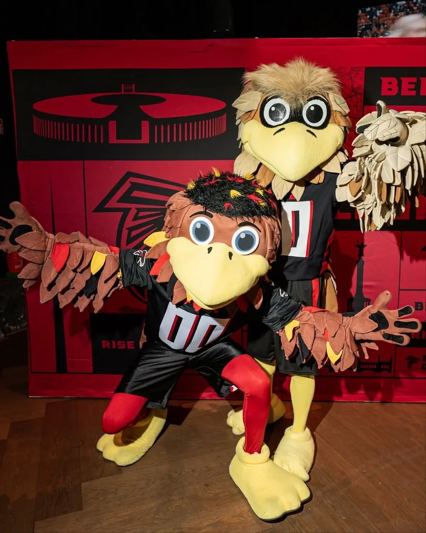 The Falcons mascots posing on the photo set