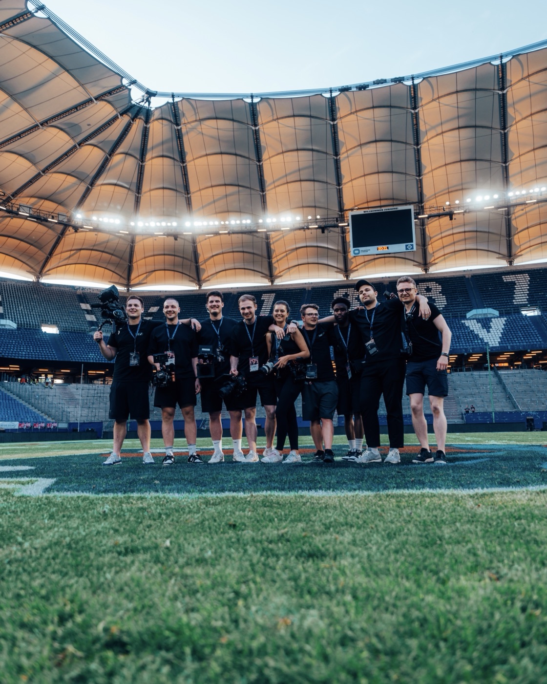 The media team on the field at Volksparkstadion Hamburg